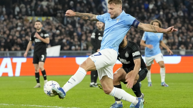 Lazio's Ciro Immobile scores his side's first goal during the Champions League, group E, soccer match between Lazio and Celtic at Rome's Olympic stadium, Tuesday, Nov. 28, 2023. (AP Photo/Alessandra Tarantino)
