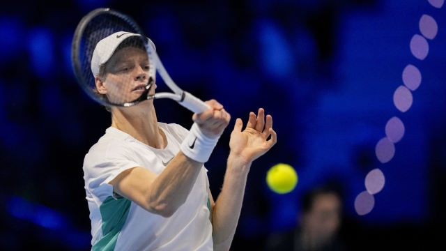 Italy's Jannik Sinner returns the ball to Russia's Daniil Medvedev during their singles semifinal tennis match of the ATP World Tour Finals at the Pala Alpitour, in Turin, Italy, Saturday, Nov. 18, 2023. (AP Photo/Antonio Calanni)   Associated Press/LaPresse Only Italy and Spain