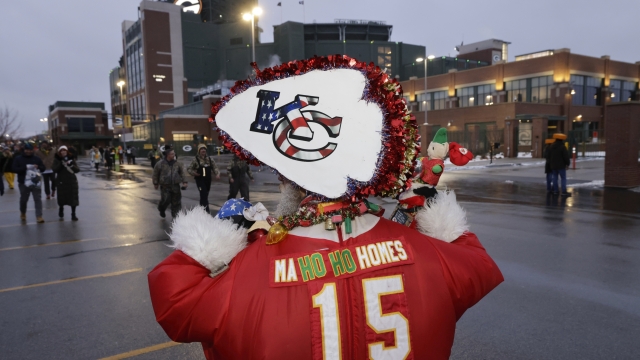 Kansas City Chiefs fan Don Lobmeyer, of Witchita, Kan., dressed with a Santa Claus theme, walks to Lambeau Field before an NFL football game against the Green Bay Packers, Sunday, Dec. 3, 2023 in Green Bay, Wis. (AP Photo/Mike Roemer)