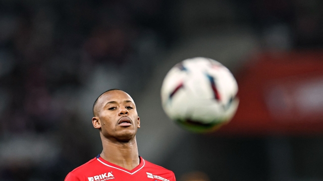 Lille's Portuguese defender Tiago Djalo eyes the ball during the French L1 football match between Lille LOSC and Clermont Foot 63 at Pierre-Mauroy stadium in Villeneuve-d'Ascq, northern France on February 1, 2023. (Photo by Sameer Al-DOUMY / AFP)