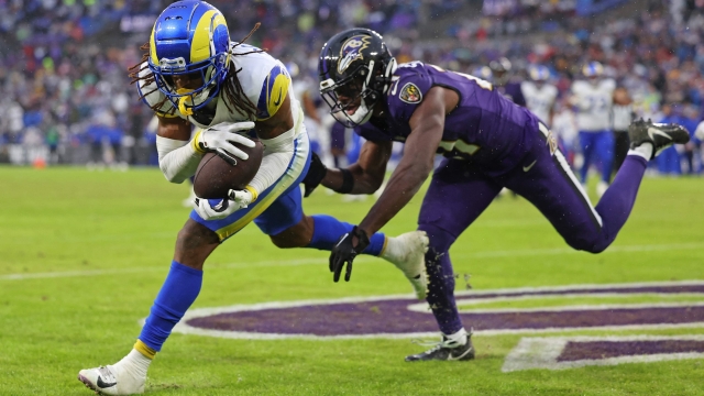 BALTIMORE, MARYLAND - DECEMBER 10: Demarcus Robinson #15 of the Los Angeles Rams catches a touchdown pass during the fourth quarter in the game against Baltimore Ravens at M&T Bank Stadium on December 10, 2023 in Baltimore, Maryland.   Todd Olszewski/Getty Images/AFP (Photo by Todd Olszewski / GETTY IMAGES NORTH AMERICA / Getty Images via AFP)