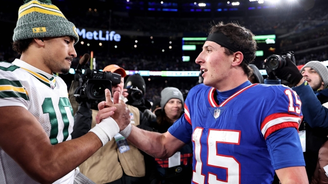 EAST RUTHERFORD, NEW JERSEY - DECEMBER 11: Jordan Love #10 of the Green Bay Packers congratulates Tommy DeVito #15 of the New York Giants on his win after the game at MetLife Stadium on December 11, 2023 in East Rutherford, New Jersey.   Dustin Satloff/Getty Images/AFP (Photo by Dustin Satloff / GETTY IMAGES NORTH AMERICA / Getty Images via AFP)