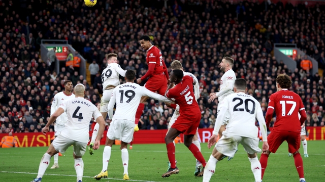 LIVERPOOL, ENGLAND - DECEMBER 17: Cody Gakpo of Liverpool heads the ball during the Premier League match between Liverpool FC and Manchester United at Anfield on December 17, 2023 in Liverpool, England. (Photo by Clive Brunskill/Getty Images)