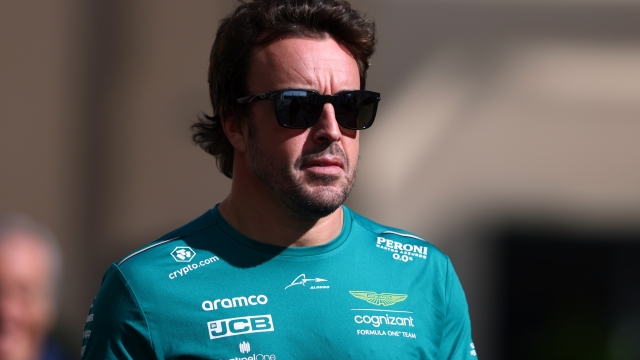 ABU DHABI, UNITED ARAB EMIRATES - NOVEMBER 23: Fernando Alonso of Spain and Aston Martin F1 Team walks in the Paddock during previews ahead of the F1 Grand Prix of Abu Dhabi at Yas Marina Circuit on November 23, 2023 in Abu Dhabi, United Arab Emirates. (Photo by Clive Rose/Getty Images)