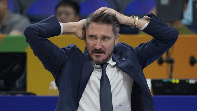 Italy coach Gianmarco Pozzecco reacts during the Basketball World Cup quarterfinal game between Italy and U.S. at the Mall of Asia Arena in Manila, Philippines, Tuesday, Sept. 5, 2023. (AP Photo/Aaron Favila)