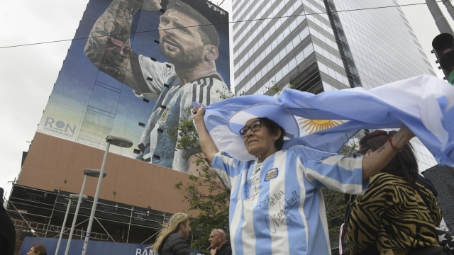 A new mural of soccer player Lionel Messi is unveiled in downtown Buenos Aires, Argentina, Monday, Dec. 18, 2023, one year after his national Argentine team won the World Cup tournament. (AP Photo/Gustavo Garello)