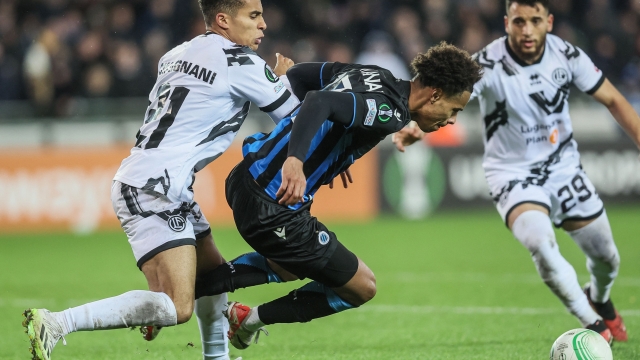 Lugano's French midfielder Yanis Cimignani (L) and Club's Canadian midfielder Tajon Buchanan fight for the ball during the the UEFA Europa Conference League Group D football match between Club Brugge KV and Swiss FC Lugano in Bruges on November 9, 2023. (Photo by BRUNO FAHY / Belga / AFP) / Belgium OUT