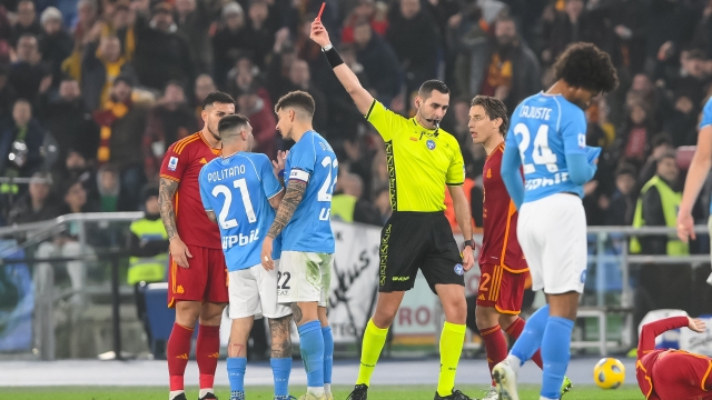 ROME, ITALY - DECEMBER 23: Matteo Politano of SSC Napoli is shown the red card from the referee Andrea Colombo during the Serie A TIM match between AS Roma and SSC Napoli at Stadio Olimpico on December 23, 2023 in Rome, Italy. (Photo by Fabio Rossi/AS Roma via Getty Images)