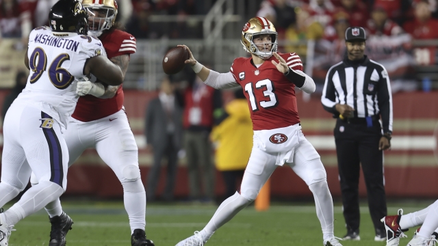 San Francisco 49ers quarterback Brock Purdy (13) passes against the Baltimore Ravens during the first half of an NFL football game in Santa Clara, Calif., Monday, Dec. 25, 2023. (AP Photo/Jed Jacobsohn)