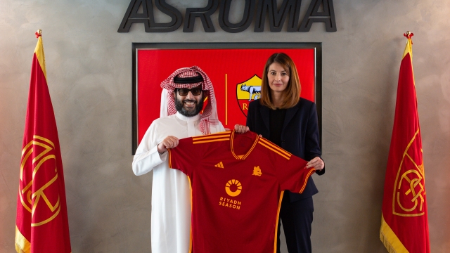 ROME, ITALY - OCTOBER 04: AS Roma CEO Lina Souloukou and His Excellency Turki Alalshikh, Chairman of Saudi Arabia?s General Entertainment Authority pose with the AS Roma jersey featuring the Riyadh Season logo at Centro Sportivo Fulvio Bernardini on October 04, 2023 in Rome, Italy. (Photo by Fabio Rossi/AS Roma via Getty Images)