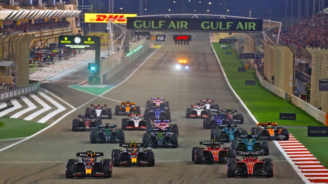 BAHRAIN, BAHRAIN - MARCH 05: Max Verstappen of the Netherlands driving the (1) Oracle Red Bull Racing RB19. and Charles Leclerc of Monaco driving the (16) Ferrari SF-23 lead the field into turn one at the start during the F1 Grand Prix of Bahrain at Bahrain International Circuit on March 05, 2023 in Bahrain, Bahrain. (Photo by Mark Thompson/Getty Images)