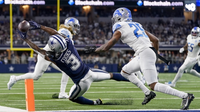 Dallas Cowboys wide receiver Brandin Cooks (3) attempts a catch in front of Detroit Lions cornerback Kindle Vildor (29) during the first half of an NFL football game, Saturday, Dec. 30, 2023, in Arlington, Texas. (AP Photo/Sam Hodde)
