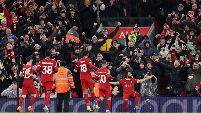 LIVERPOOL, ENGLAND - JANUARY 01: Mohamed Salah of Liverpool celebrates after scoring their sides fourth goal from the penalty spot during the Premier League match between Liverpool FC and Newcastle United at Anfield on January 01, 2024 in Liverpool, England. (Photo by Jan Kruger/Getty Images)