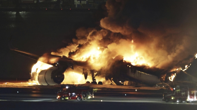 A Japan Airlines plane is on fire on the runway of Haneda airport on Tuesday, Jan. 2, 2024 in Tokyo, Japan.  (Kyodo News via AP)