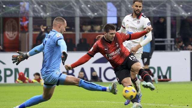 MILAN, ITALY - JANUARY 02: Luka Jovic of AC Milan scores the opening goal during the Coppa Italia Round of Sixteen match between AC Milan and Cagliari Calcio on January 02, 2024 in Milan, Italy. (Photo by Giuseppe Cottini/AC Milan via Getty Images )