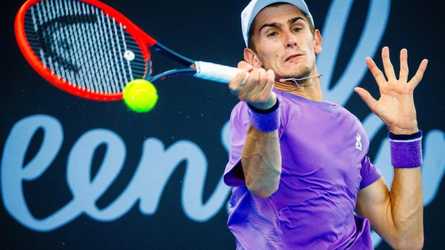 Italia's Matteo Arnaldi hits a return during his men's singles match against Russia' Roman Safiullin at the Brisbane International tennis tournament in Brisbane on January 5, 2024. (Photo by Patrick HAMILTON / AFP) / -- IMAGE RESTRICTED TO EDITORIAL USE - STRICTLY NO COMMERCIAL USE --
