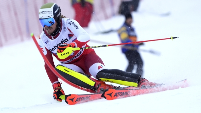 Austria's Manuel Feller competes during the first run of an alpine ski, men's World Cup slalom race, in Adelboden, Switzerland, Sunday, Jan. 7, 2024. (AP Photo/Giovanni Auletta)