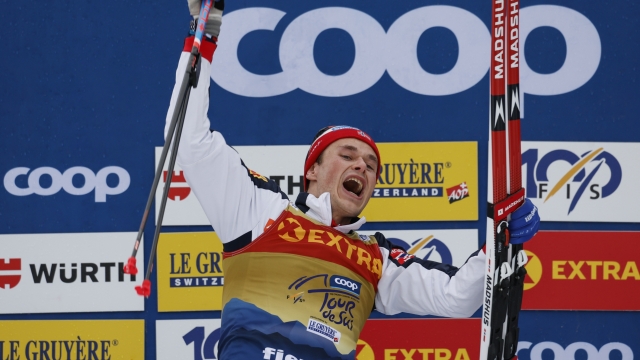 Norway's Harald Oestberg Amundsen celebrates winning the Tour de Ski overall trophy, in Val di Fiemme, Italy, Sunday, Jan. 7, 2024. (AP Photo/Alessandro Trovati)