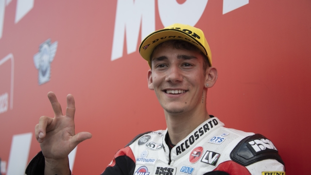 ASSEN, NETHERLANDS - JUNE 24: Riccardo Rossi of Italy and SIC58 Squadra Corse  celebrates the third place in Moto3 during the MotoGP of Netherlands - Qualifying at TT Circuit Assen on June 24, 2023 in Assen, Netherlands. (Photo by Mirco Lazzari gp/Getty Images)