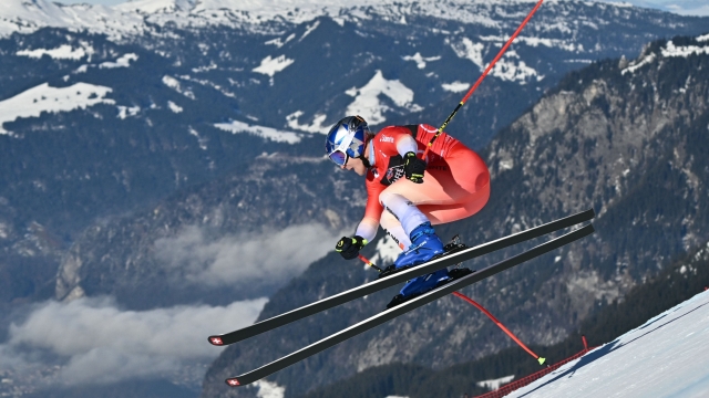 TOPSHOT - Switzerland's Marco Odermatt competes in the Downhill of the FIS Alpine Skiing Men's World Cup event in Wengen on January 13, 2024. (Photo by FABRICE COFFRINI / AFP)