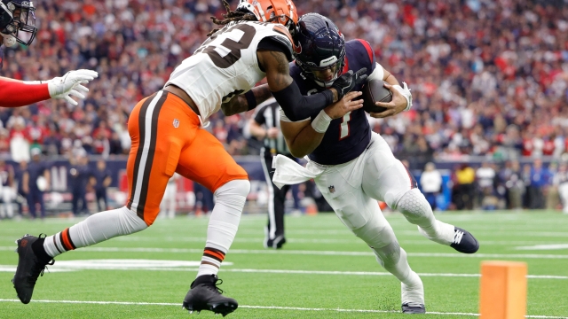 HOUSTON, TEXAS - JANUARY 13: C.J. Stroud #7 of the Houston Texans drives against Martin Emerson Jr. #23 of the Cleveland Browns during the first quarter in the AFC Wild Card Playoffs at NRG Stadium on January 13, 2024 in Houston, Texas.   Carmen Mandato/Getty Images/AFP (Photo by Carmen Mandato / GETTY IMAGES NORTH AMERICA / Getty Images via AFP)