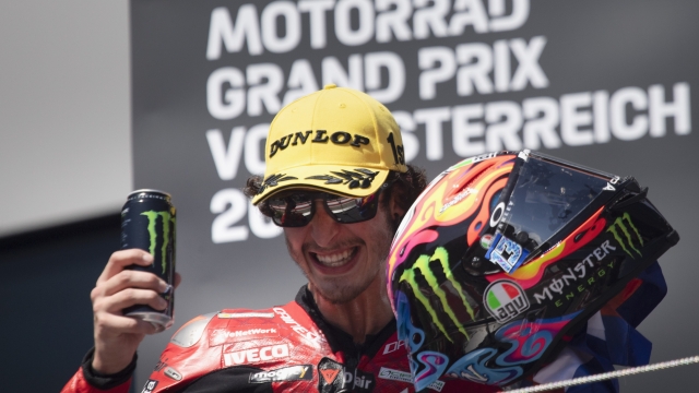 SPIELBERG, AUSTRIA - AUGUST 20: Celestino Vietti Ramus of Italy and Fantic Racing celebrates the victory on the podium during the Moto2 race during the MotoGP of Austria - Race at Red Bull Ring on August 20, 2023 in Spielberg, Austria. (Photo by Mirco Lazzari gp/Getty Images)