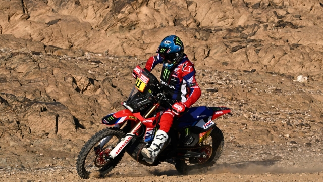 Monster Energy Honda Team's Chilean biker Jose Ignacio Cornejo Florimo competes during stage 7 between Riyad and Al Duwadimi on January 14, 2024, as part of the Dakar rally 2024. (Photo by PATRICK HERTZOG / AFP)