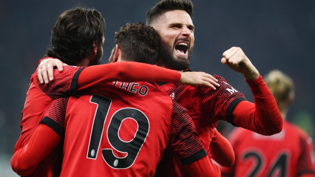 MILAN, ITALY - JANUARY 14: Olivier Giroud of AC Milan celebrates his side's third goal scored by Theo Hernandez of AC Milan during the Serie A TIM match between AC Milan and AS Roma - Serie A TIM  at Stadio Giuseppe Meazza on January 14, 2024 in Milan, Italy. (Photo by Marco Luzzani/Getty Images)