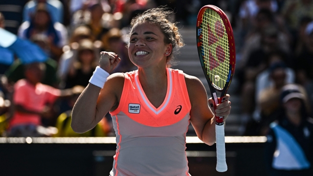 Italy's Jasmine Paolini celebrates after victory against Russia's Diana Shnaider during their women's singles match on day two of the Australian Open tennis tournament in Melbourne on January 15, 2024. (Photo by Lillian SUWANRUMPHA / AFP) / -- IMAGE RESTRICTED TO EDITORIAL USE - STRICTLY NO COMMERCIAL USE --
