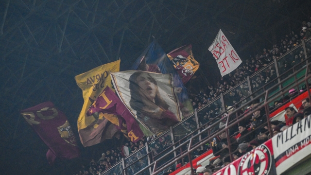 MILAN, ITALY - JANUARY 14: AS Roma fans during the Serie A TIM match between AC Milan and AS Roma - Serie A TIM  at Stadio Giuseppe Meazza on January 14, 2024 in Milan, Italy. (Photo by Fabio Rossi/AS Roma via Getty Images)