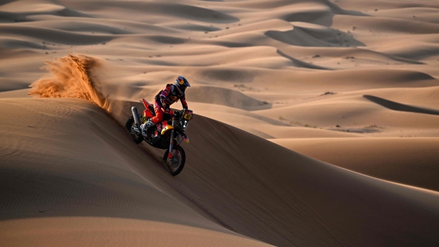 Red Bull KTM Factory Racing's Argentinian rider Kevin Benavides competes during Stage 2 of the Dakar Rally 2024, between Al Henakiyah and Al Duwadimi, Saudi Arabia, on January 7, 2024. (Photo by PATRICK HERTZOG / AFP)