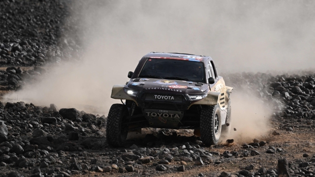 Overdrive Racing's French driver Guerlain Chicherit and his French co-driver Alex Winocq steer their car during the stage 8 of the 2024 Dakar Rally, between Al Duwadimi and Hail, Saudi Arabia, on January 15, 2024. (Photo by PATRICK HERTZOG / AFP)