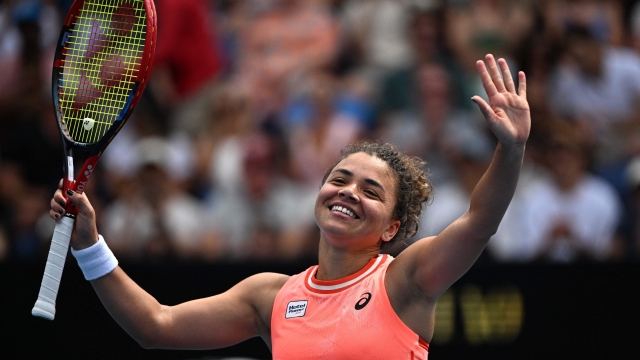 Italy's Jasmine Paolini celebrates victory against Russia's Anna Blinkova during their women's singles match on day seven of the Australian Open tennis tournament in Melbourne on January 20, 2024. (Photo by Anthony WALLACE / AFP) / -- IMAGE RESTRICTED TO EDITORIAL USE - STRICTLY NO COMMERCIAL USE --