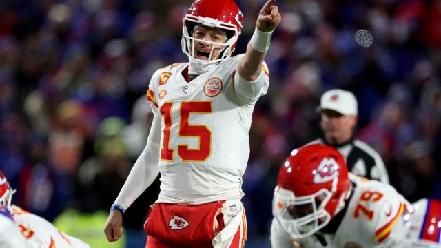 ORCHARD PARK, NEW YORK - JANUARY 21: Patrick Mahomes #15 of the Kansas City Chiefs points against the Buffalo Bills during the second quarter in the AFC Divisional Playoff game at Highmark Stadium on January 21, 2024 in Orchard Park, New York.   Al Bello/Getty Images/AFP (Photo by AL BELLO / GETTY IMAGES NORTH AMERICA / Getty Images via AFP)