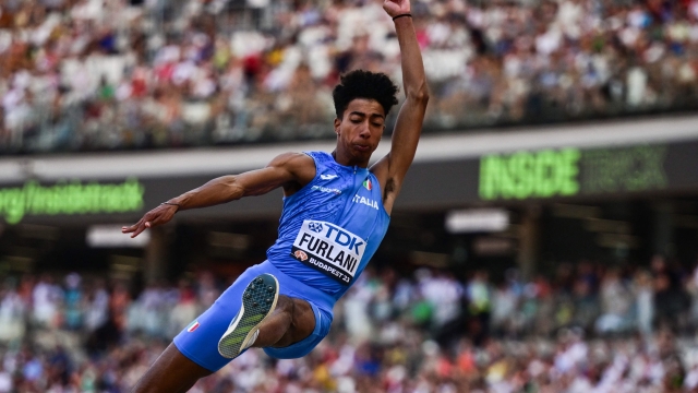 Italy's Mattia Furlani competes in the men's long jump qualification during the World Athletics Championships at the National Athletics Centre in Budapest on August 23, 2023. (Photo by Ben Stansall / AFP)