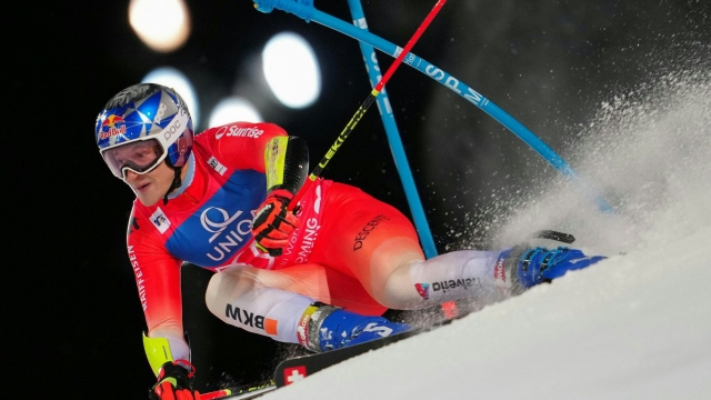 Switzerland's Marco Odermatt competes during the second run of the Men's Giant Slalom event of the FIS Alpine Skiing World Cup in Schladming, Austria, on January 23, 2024. (Photo by GEORG HOCHMUTH / APA / AFP) / Austria OUT