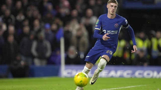 Chelsea's Cole Palmer controls the ball during the English League Cup semi final second leg soccer match between Chelsea and Middlesbrough at the Stamford Bridge stadium in London, England, Tuesday, Jan. 23, 2024. (AP Photo/Kin Cheung)
