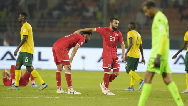 Tunisia's players react at the end of the African Cup of Nations Group E soccer match between South Africa and Tunisia in Korhogo, Ivory Coast, Wednesday, Jan. 24, 2024. (AP Photo/Themba Hadebe)