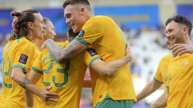 Australian players celebrate after scoring third goal during the Asian Cup round of 16 soccer match between Australia and Indonesia at Jassim Bin Hamad Stadium in Doha, Qatar, Sunday, Jan. 28, 2024. (AP Photo/Hussein Sayed)