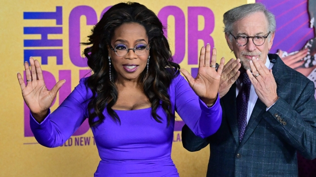 US filmmaker Steven Spielberg (R) and US television host and producer Oprah Winfrey arrive for the world premiere of "The Color Purple" at the Academy Museum in Los Angeles, December 6, 2023. (Photo by Frederic J. BROWN / AFP)