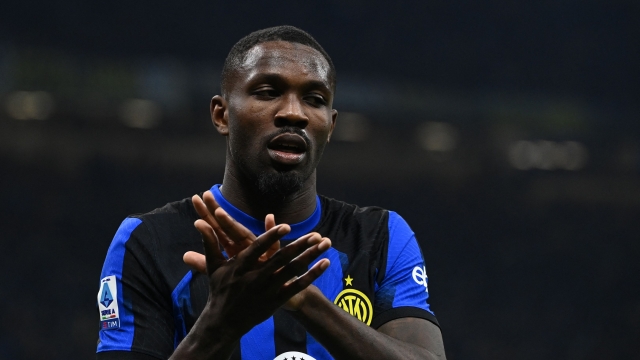 Inter Milan's French forward #9 Marcus Thuram applauds as he leaves the pitch for substitution during the Serie A football match between Inter Milan and Juventus at the San Siro stadium in Milan, on February 4, 2024. (Photo by Isabella BONOTTO / AFP)