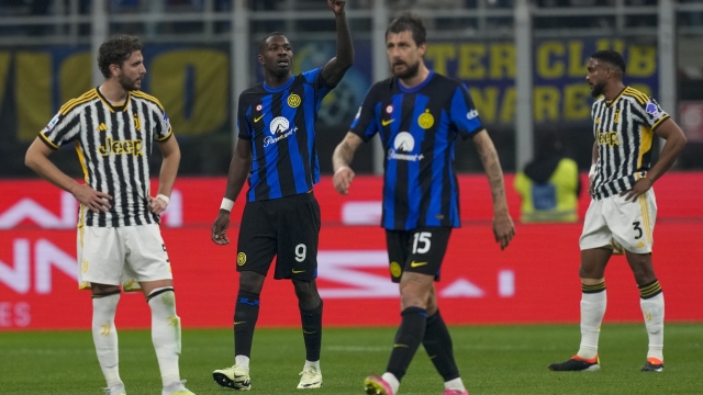 Inter Milan's Marcus Thuram, second from left, and Inter Milan's Francesco Acerbi celebrate after Juventus' Federico Gatti scored an own goal during a Serie A soccer match between Inter Milan and Juventus, in Milan, Italy, Sunday, Feb. 4, 2024. (AP Photo/Antonio Calanni)