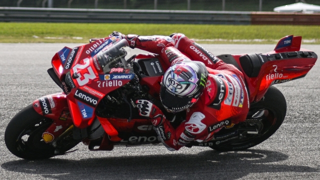 Ducati Lenovo Team's Italian rider Enea Bastianini takes a corner during the first day of the pre-season MotoGP test at the Sepang International Circuit in Sepang on February 6, 2024. (Photo by Mohd RASFAN / AFP)