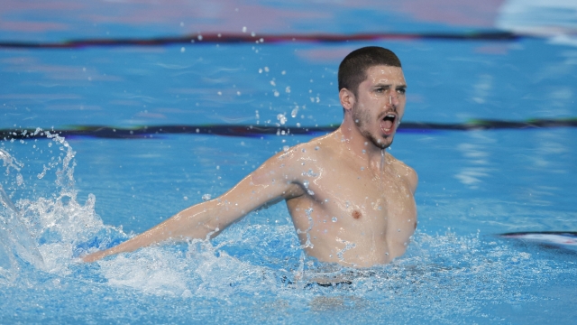 epa11129711 Giorgio Minisini of Italy competes in the Men Solo Technical Final artistic swimming event at the FINA World Aquatics Championships in Doha, Qatar, 05 February 2024.  EPA/MOHAMED MESSARA