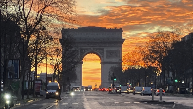 The sun rises on the Arc de Triomphe Tuesday, Jan. 16, 2024 in Paris. (AP Photo/Bertrand Combaldieu)