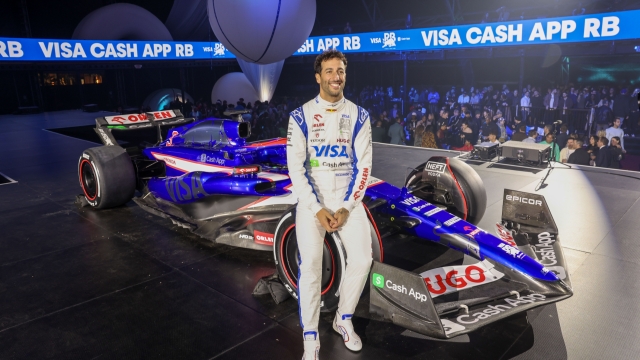 2024 Visa Cash App RB Car Launch in Las Vegas LAS VEGAS, NEVADA - FEBRUARY 08: Daniel Ricciardo of Australia and Visa Cash App RB poses for a photo with the Visa Cash App RB VCARB 01 at the Visa Cash App RB Livery Launch Event Las Vegas on February 08, 2024 in Las Vegas, Nevada. (Photo by Jesse Grant/Getty Images for Visa Cash App RB) // Getty Images / Red Bull Content Pool // SI202402090085 // Usage for editorial use only //