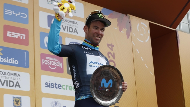 epa11140357 British rider Mark Cavendish of Astana Qazaqstan Team celebrates on the podium after winning the fourth stage of the Tour Colombia 2024 cycling race over 181.2km from Paipa to Zipaquira, Colombia, 09 February 2024.  EPA/Carlos Ortega
