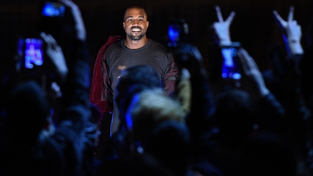 (FILES) US rapper Kanye West performs during his concert in central Yerevan on April 13, 2015. A genre, a culture and a lifestyle all at once: hip hop has traveled from the block party to the billionaire's club, soundtracked protest and celebration, and asserted seismic influence over the course of pop. The reigning music style evolved in rapid, anarchic ways, rocking the industry establishment that long resisted its power, and fully embodying the culture of youth even as it grew. This year hip hop turns 50, an anniversary that's offered its elders, its fans and the city that birthed it a milepost to reflect on its cultural weight. (Photo by KAREN MINASYAN / AFP)