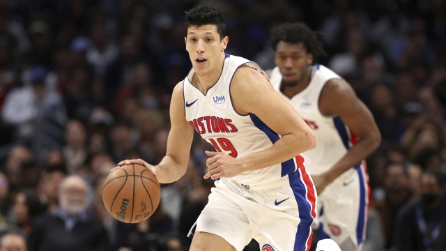 Detroit Pistons forward Simone Fontecchio, front, brings the ball down the court during the second half of an NBA basketball game against the Los Angeles Clippers, Saturday, Feb. 10, 2024, in Los Angeles. (AP Photo/Raul Romero Jr.)