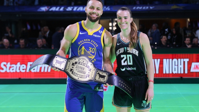 INDIANAPOLIS, INDIANA - FEBRUARY 17: Stephen Curry #30 of the Golden State Warriors and Sabrina Ionescu #20 of the New York Liberty pose for a photo after their 3-point challenge during the State Farm All-Star Saturday Night at Lucas Oil Stadium on February 17, 2024 in Indianapolis, Indiana. NOTE TO USER: User expressly acknowledges and agrees that, by downloading and or using this photograph, User is consenting to the terms and conditions of the Getty Images License Agreement.   Stacy Revere/Getty Images/AFP (Photo by Stacy Revere / GETTY IMAGES NORTH AMERICA / Getty Images via AFP)